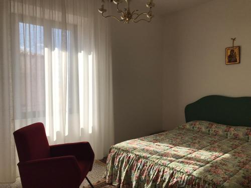 Llit o llits en una habitació de Sardegna vicino ad Olbia "La casa nel vicolo"