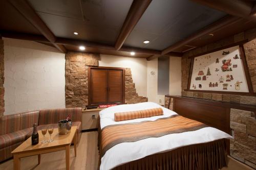 Katil atau katil-katil dalam bilik di Yokkaichi Blanc Chapel Christmas (Adult Only)