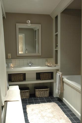 Ein Badezimmer in der Unterkunft De Waterzooi Suites