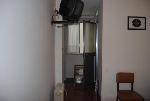 Μια τηλεόραση ή/και κέντρο ψυχαγωγίας στο Hotel Peninsular- Porto
