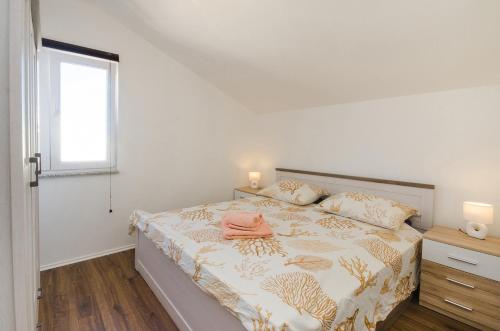 Posteľ alebo postele v izbe v ubytovaní Apartman Korina