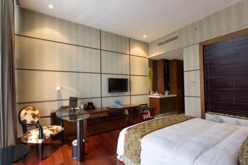 Postel nebo postele na pokoji v ubytování Hiyet Oriental Hotel
