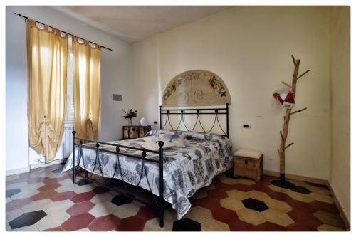 a bedroom with a bed in a room at La Casa sul Molo in Viareggio