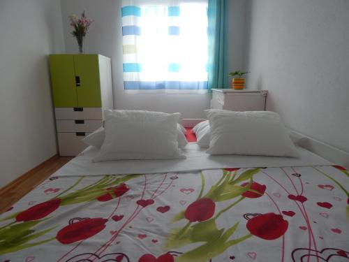 Posteľ alebo postele v izbe v ubytovaní Apartman Karlo