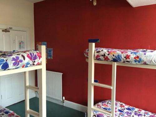 Ένα ή περισσότερα κρεβάτια σε δωμάτιο στο Pitlochry Backpackers