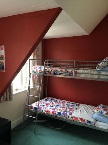 Ένα ή περισσότερα κρεβάτια σε δωμάτιο στο Pitlochry Backpackers