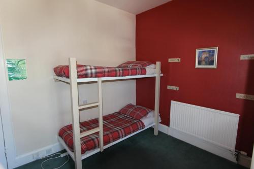 Ένα ή περισσότερα κρεβάτια σε δωμάτιο στο Pitlochry Backpackers
