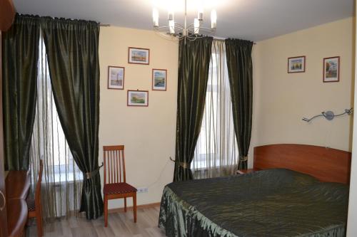 Nevskaya Classika tesisinde bir odada yatak veya yataklar