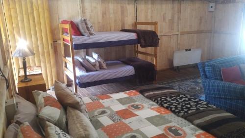a room with two bunk beds and a bed at Isikhoma-Khoma in Hilton