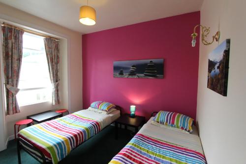 Ένα ή περισσότερα κρεβάτια σε δωμάτιο στο Pitlochry Backpackers