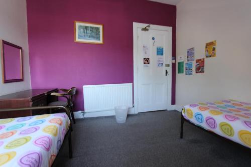 Ένα ή περισσότερα κρεβάτια σε δωμάτιο στο Pitlochry Backpackers