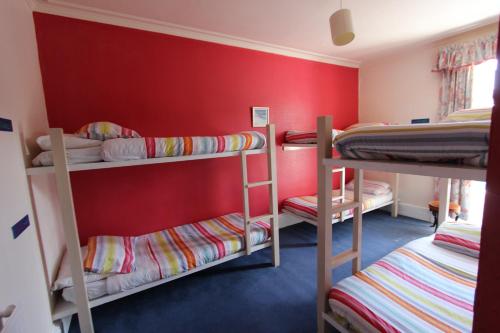 Ένα ή περισσότερα κρεβάτια σε δωμάτιο στο Pitlochry Backpackers