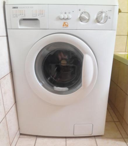 a white washer and dryer in a kitchen at Villa Eleni in Ofrínion