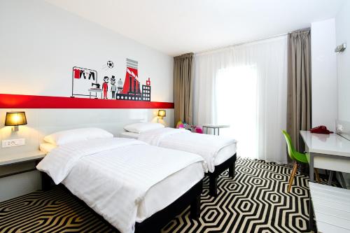 ibis Styles Aradにあるベッド