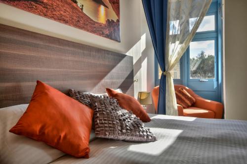 Postel nebo postele na pokoji v ubytování Central Suites St. Julian's