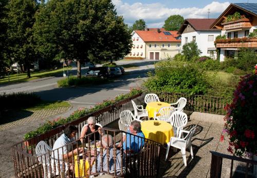 a group of people sitting at a table at Landhotel-Gasthof-Schreiner in Hohenau