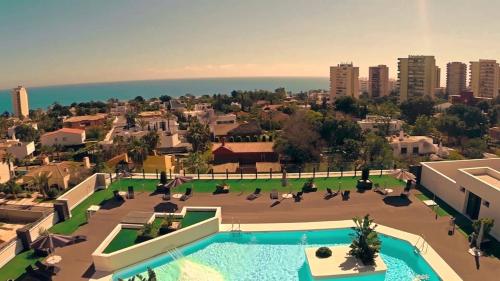 an aerial view of a resort with a swimming pool at Ático de lujo en el centro in Aguadulce