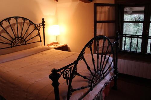 Cama ou camas em um quarto em Mañuko Benta