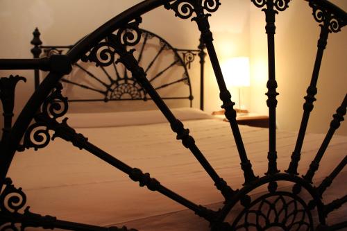 a close up of an iron bed frame with at Mañuko Benta in Bermeo