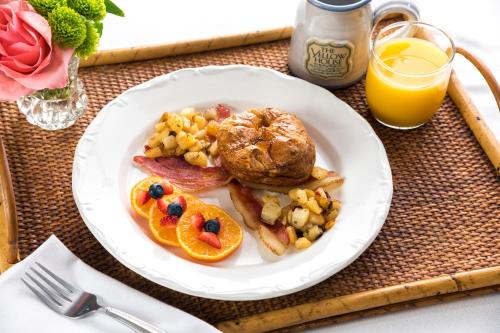 a plate of breakfast food on a table at The Yellow House on Plott Creek in Waynesville