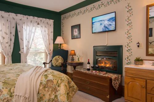 Ένα ή περισσότερα κρεβάτια σε δωμάτιο στο Sutherland House Victorian Bed and Breakfast