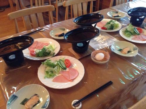 
plates of food on a table at Soratobu Usagi in Myoko

