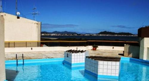 The swimming pool at or close to Apto Ponta das Canas - Floripa