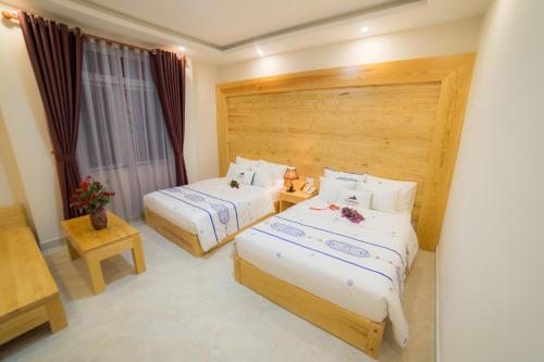 Postel nebo postele na pokoji v ubytování Starhill Hotel