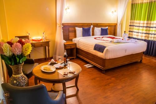 Postel nebo postele na pokoji v ubytování Eastmark Hotel