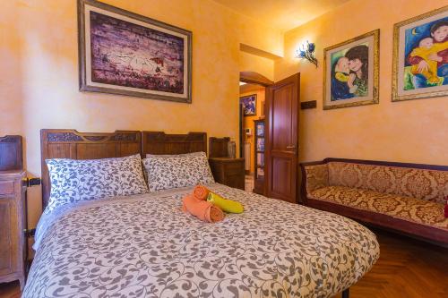 Łóżko lub łóżka w pokoju w obiekcie B&B Casa Florinda