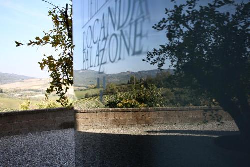 a window with a view of a mountain view at Locanda Palazzone in Orvieto