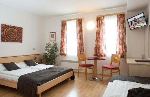 Hotel am See Rustにあるベッド
