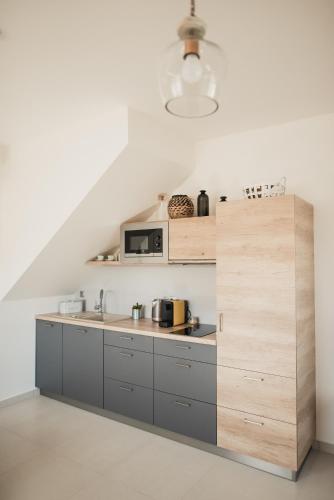 Una cocina o cocineta en Apartmán Dunajky