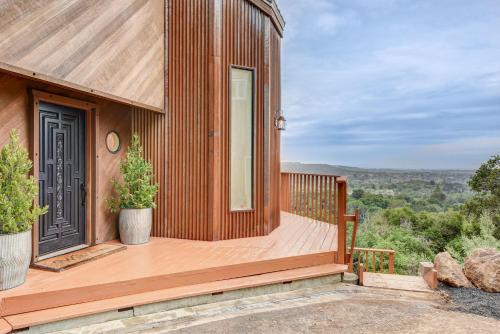 a house with a wooden deck with a view at Napa Valley Guest House Cottage in Napa