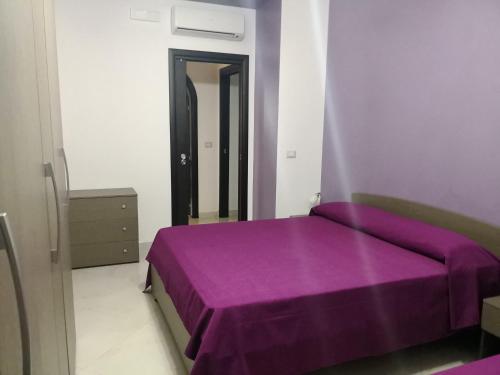 Postel nebo postele na pokoji v ubytování B&B LA CASA DI GIORGIA DI PELLICANO' FRANCESCA
