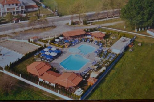 an aerial view of a resort with a swimming pool at Oasi in Kato Loutraki