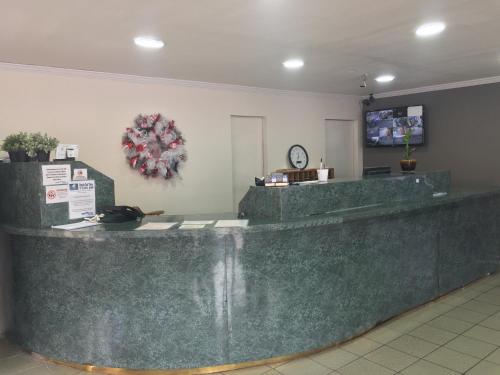 El vestíbulo o zona de recepción de Budget Inn Motel