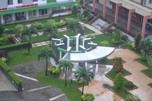 an aerial view of a park in a building at Green Lake View - Tower E 59 Acuan Laundry Time in Pondokcabe Hilir