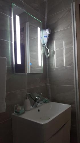 Koupelna v ubytování Apartmani Šarm
