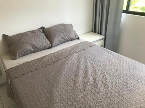 Cama o camas en una habitación en Flat Parque Jaqueira Home Service