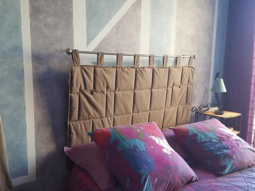 Ένα ή περισσότερα κρεβάτια σε δωμάτιο στο chambre chez l'habitant
