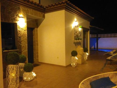 a room with several glass vases with lights on it at Casa Mararía in Gran Tarajal
