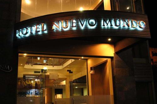 a sign on the front of a hotel nuevo mondo at Nuevo Mundo in San Rafael