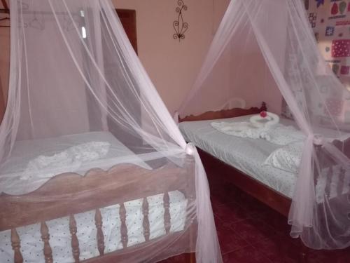 Ένα ή περισσότερα κρεβάτια σε δωμάτιο στο El Güis hostel