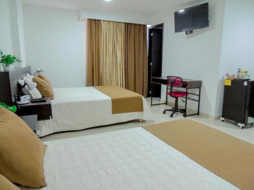 Hotel San Martinにあるベッド