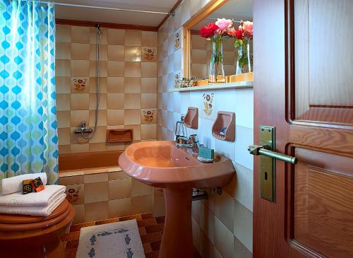 a bathroom with a sink and a toilet at Villa Mare in Tersanas