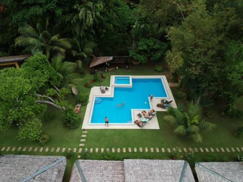 A view of the pool at La Natura Resort or nearby
