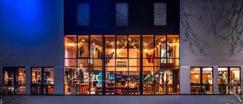 a building with a lot of windows on it at Radisson Hotel Zurich Airport in Rümlang
