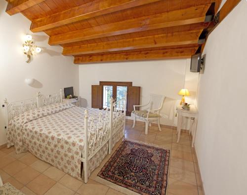 Postel nebo postele na pokoji v ubytování Villa Scalabrini