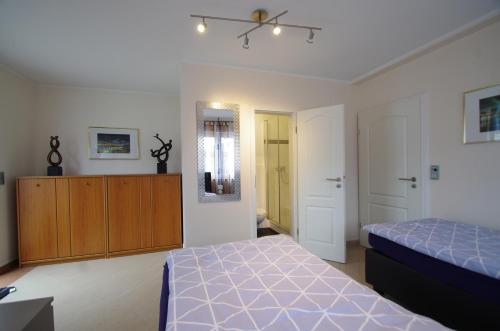 Postel nebo postele na pokoji v ubytování Luxury-Apartment Peter